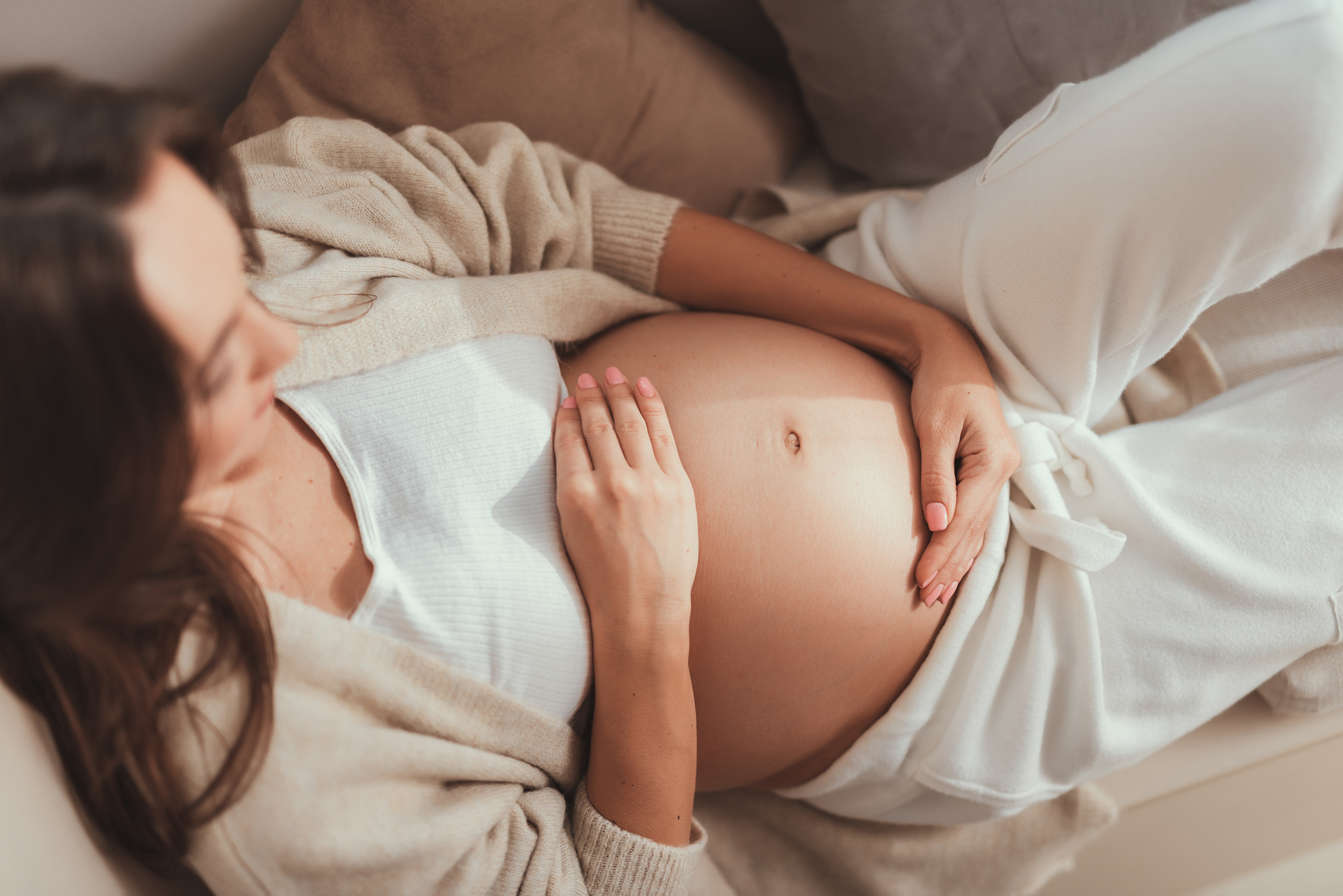 image of pregant woman holding belly